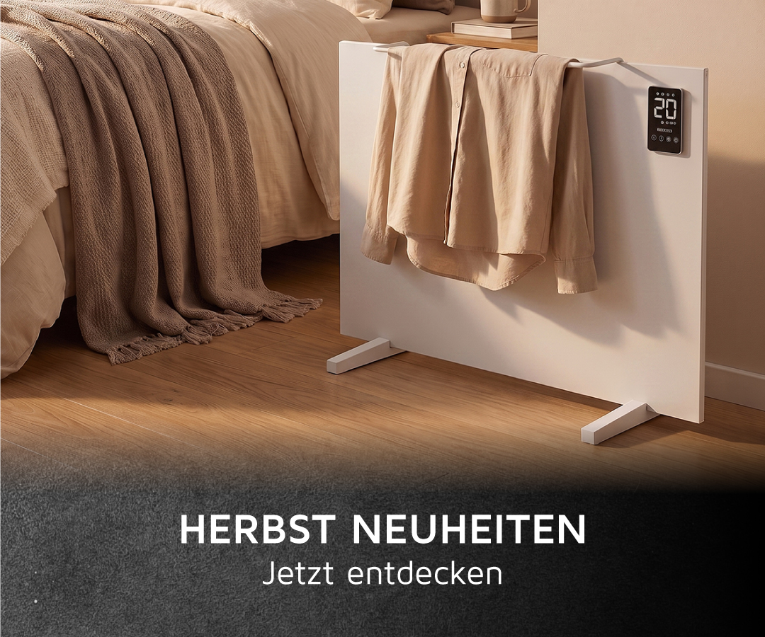 Brandson-Konvektionsheizgerät in Weiß mit Digitalanzeige, auf Füßen stehend und mit einem Hemd über dem integrierten Wäscheständer in einem Schlafzimmer.