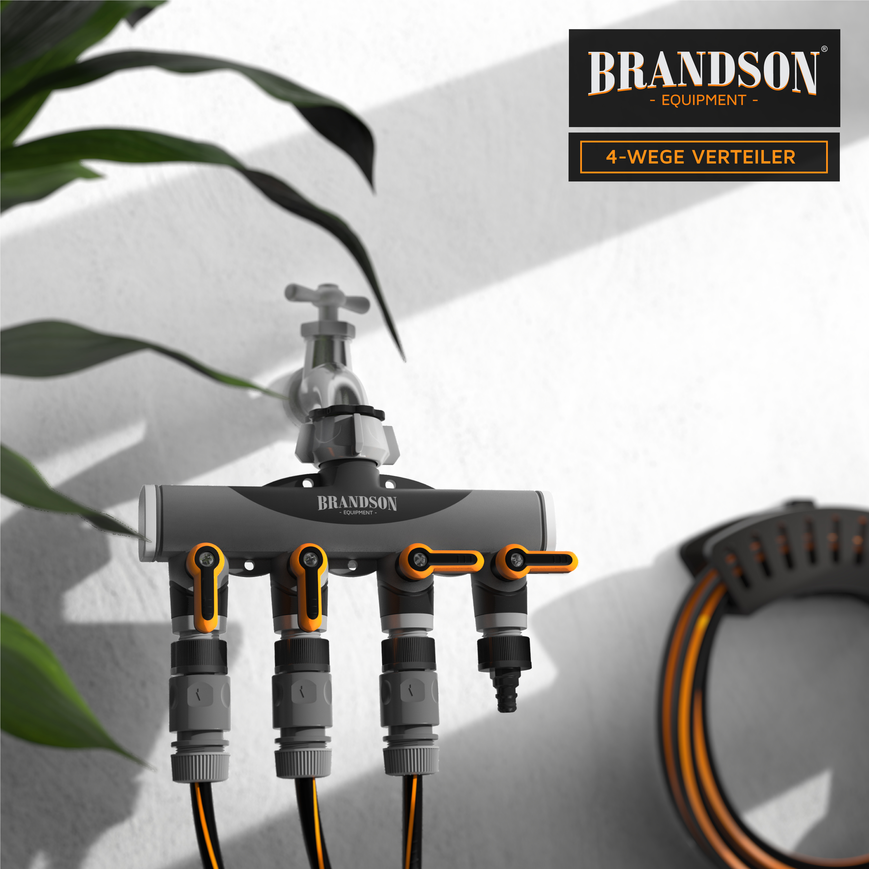 Brandson 4-Wege-Verteiler mit grauem Gehäuse und orangefarbenen Bedienhebeln, montiert an einem Wasserhahn.