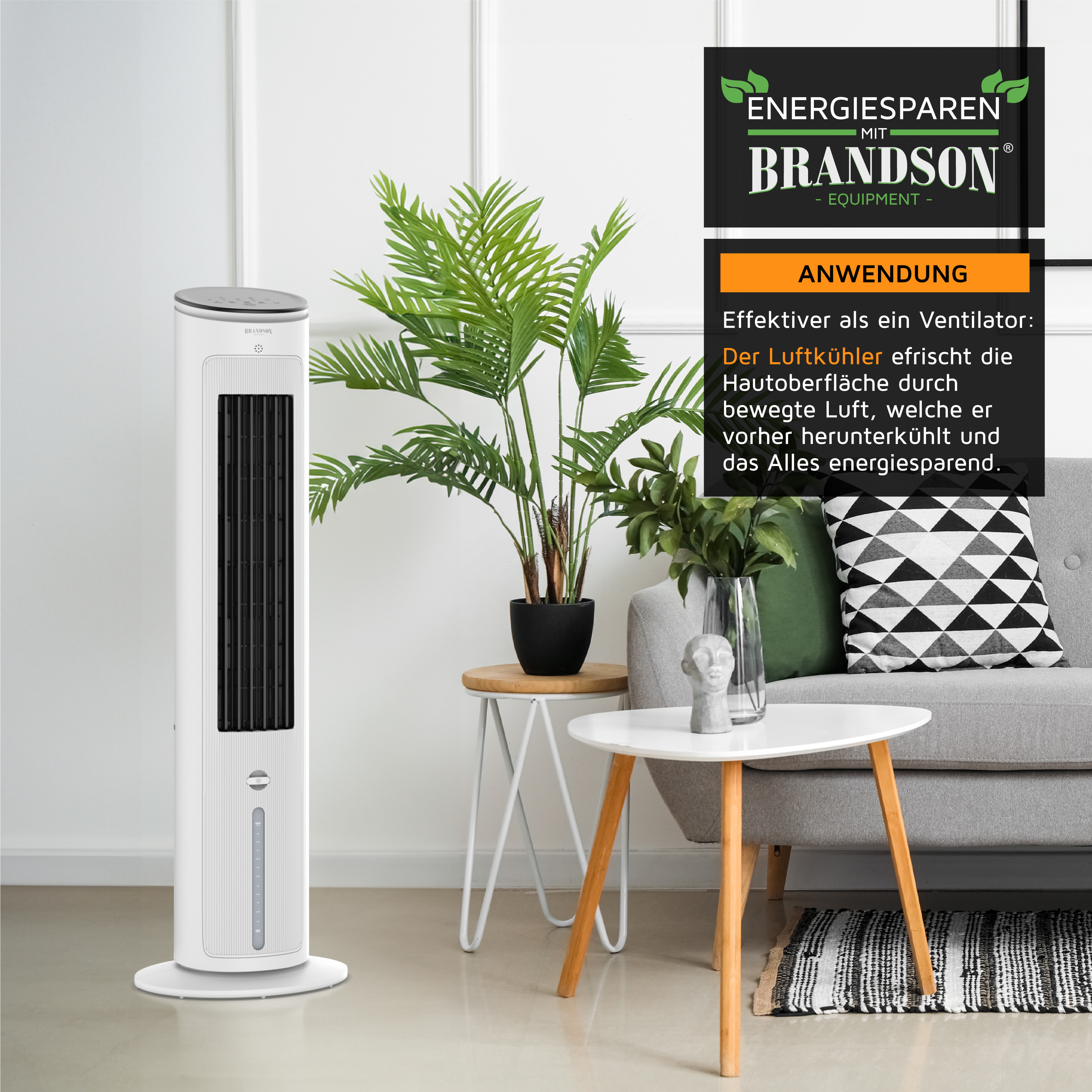 Brandson Turmventilator in Weiß mit elegantem Design, mit Bedienfeld und platziert neben einer Pflanze und modernen Möbeln.