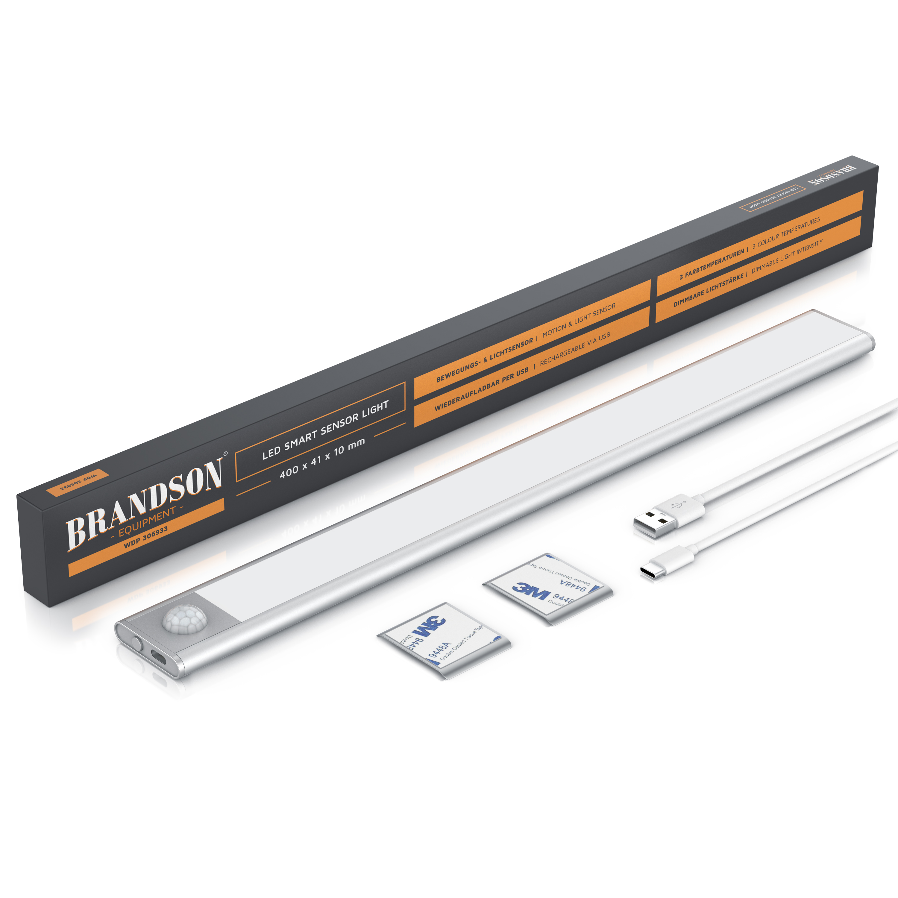 Smarte LED-Sensorleuchte von Brandson in Silber mit Bewegungssensor, USB-Ladekabel und abgebildeter Verpackung.