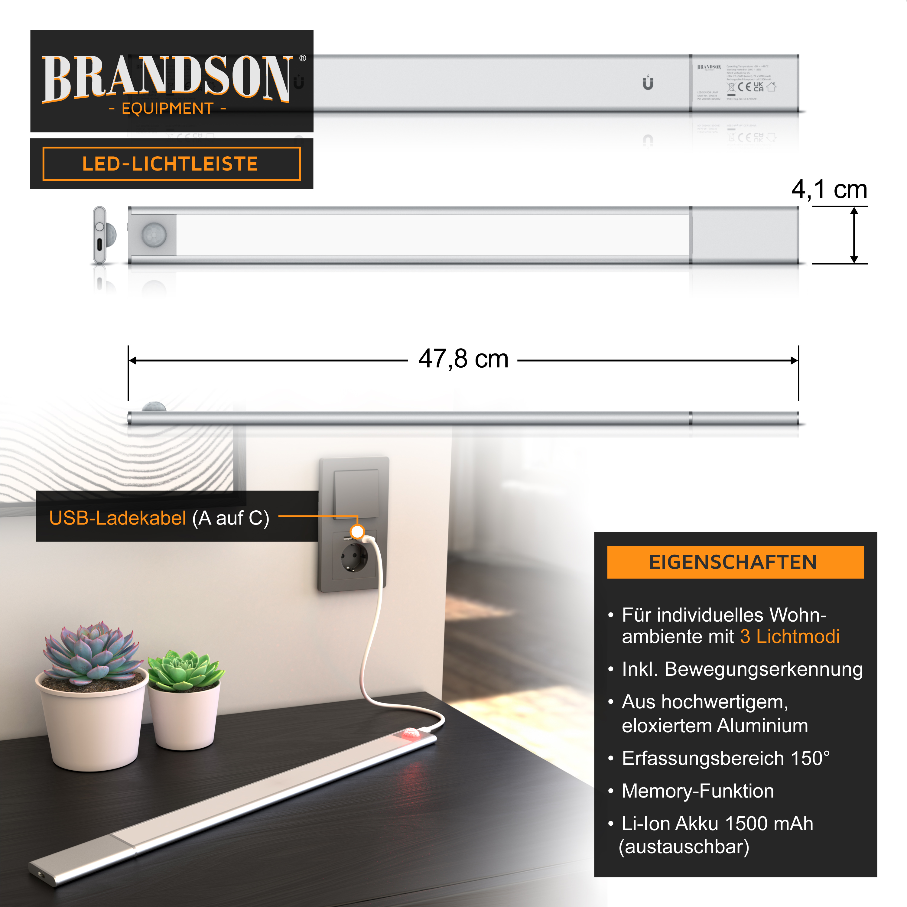 Brandson LED-Lichtleiste in Silber mit elegantem Design, USB-Ladeanschluss und Bewegungserkennungsfunktion, platziert auf einem Tisch mit Pflanzen.